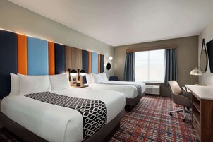 Premium bedding, desk, blackout drapes, soundproofing