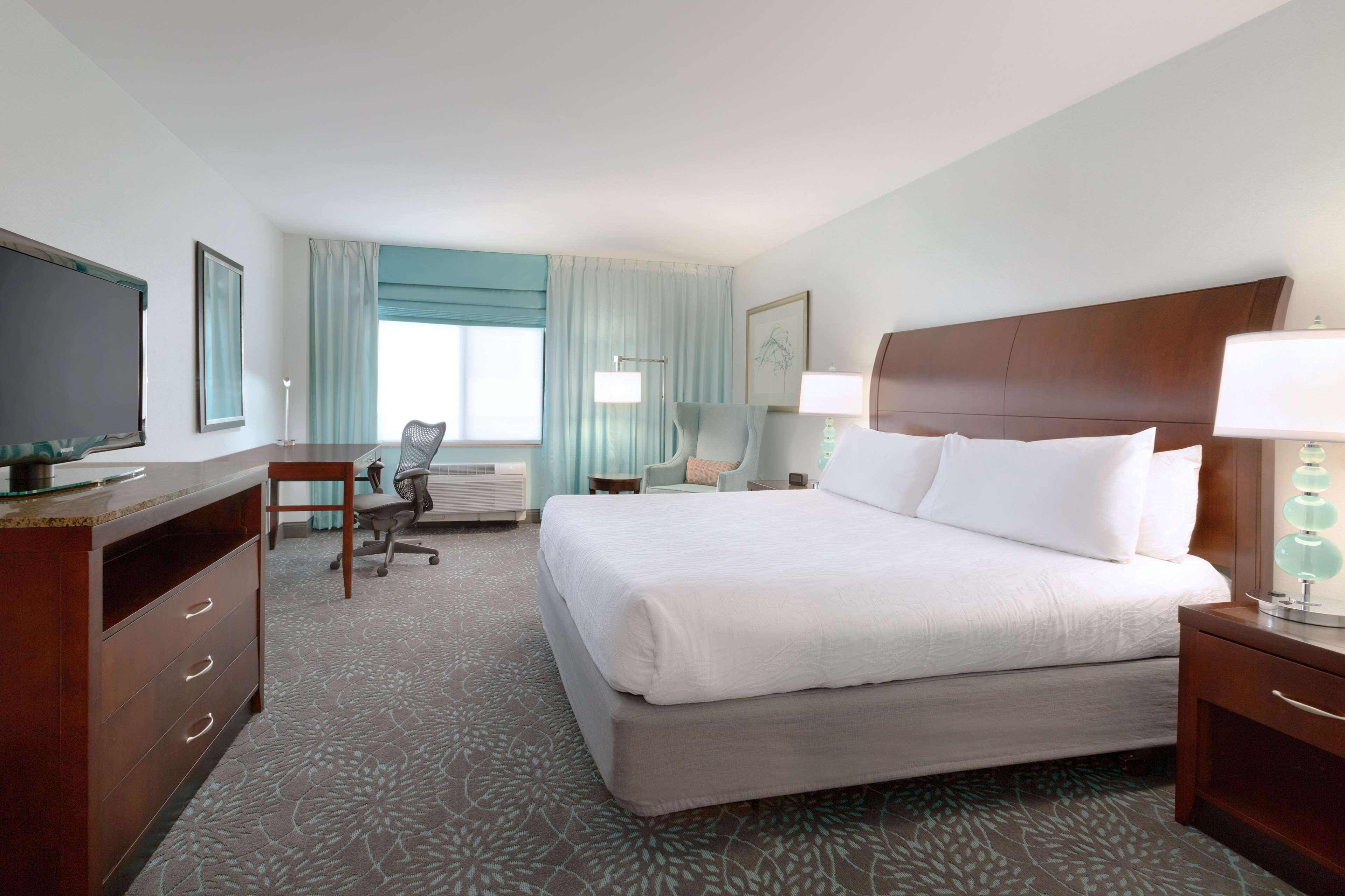 desk, laptop workspace, iron/ironing board, free cots/infant beds