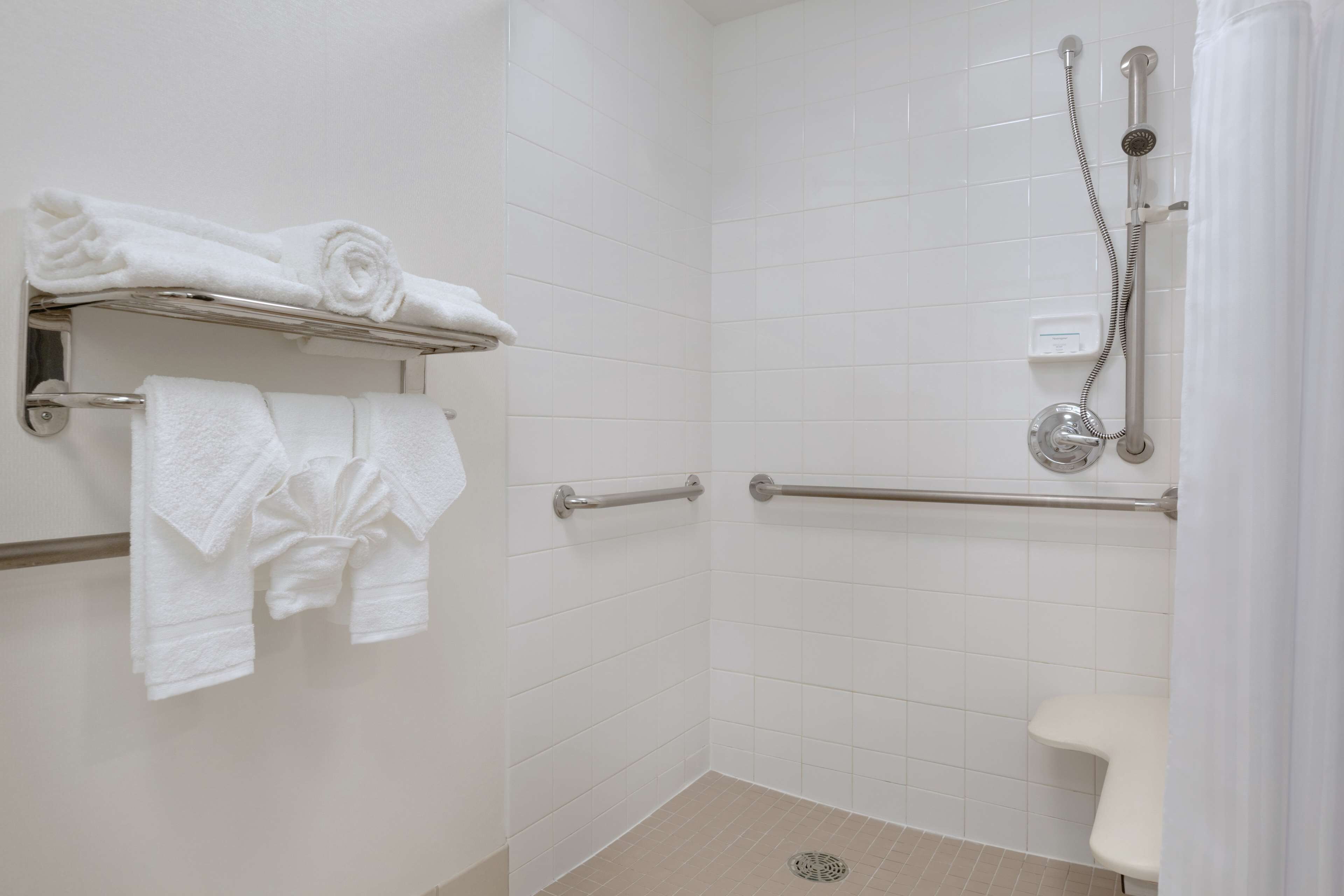 combined shower/bathtub, free toiletries, hair dryer, towels