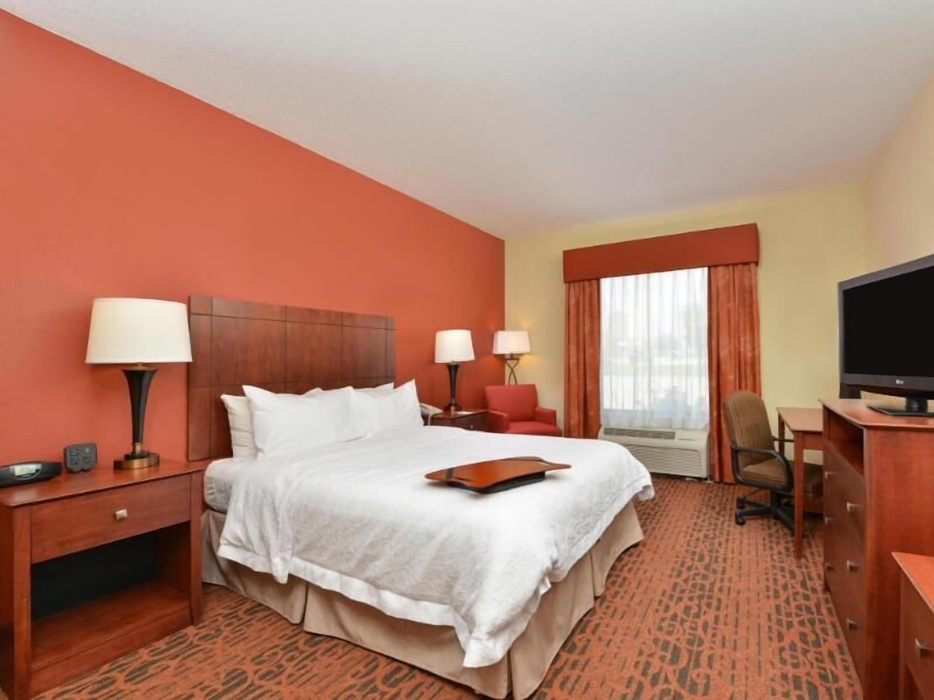 Desk, laptop workspace, blackout curtains, iron/ironing board