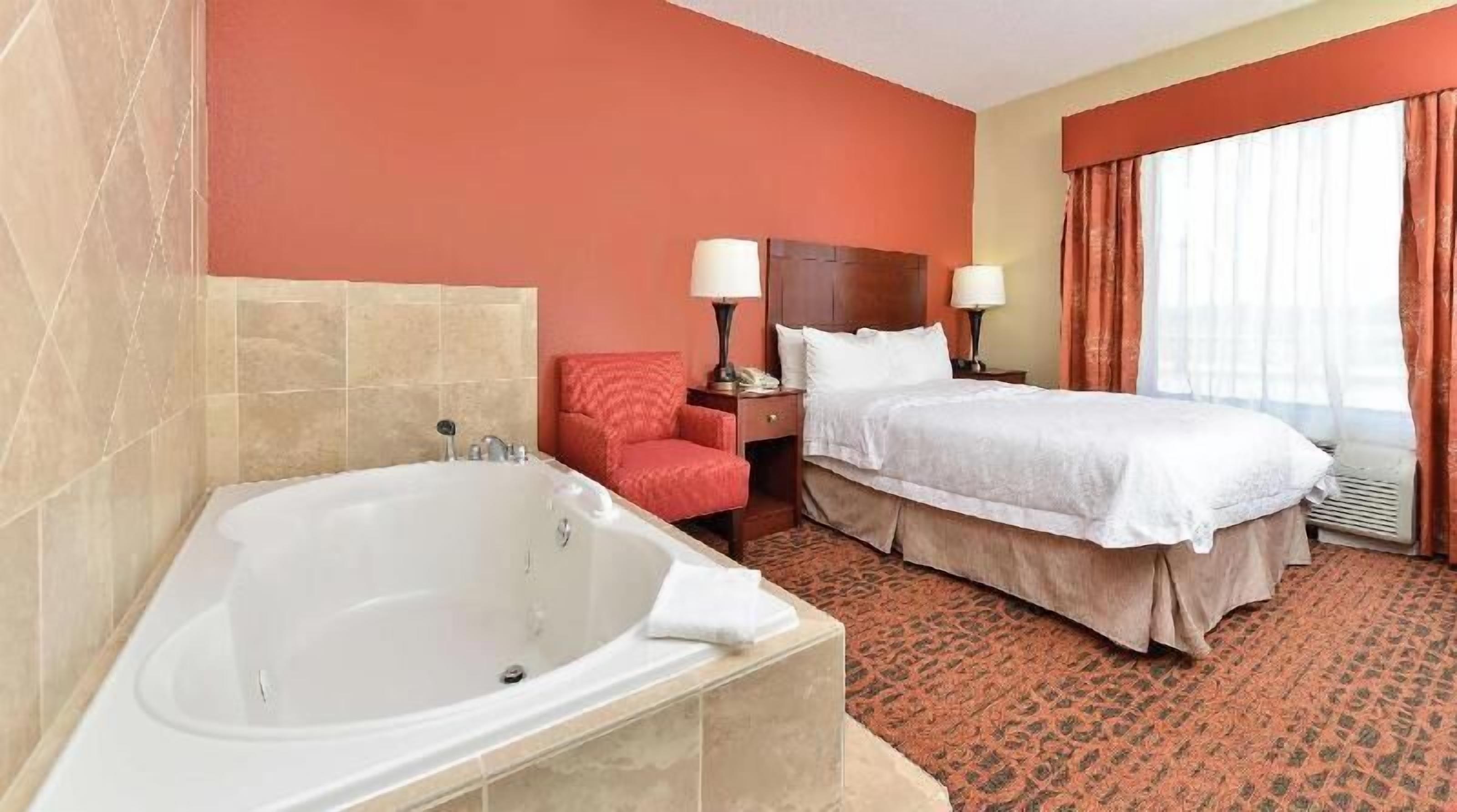 Desk, laptop workspace, blackout curtains, iron/ironing board