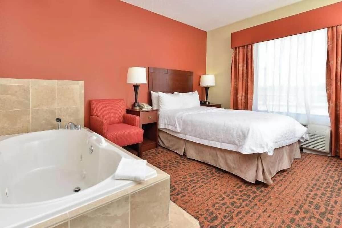 Desk, laptop workspace, blackout drapes, iron/ironing board