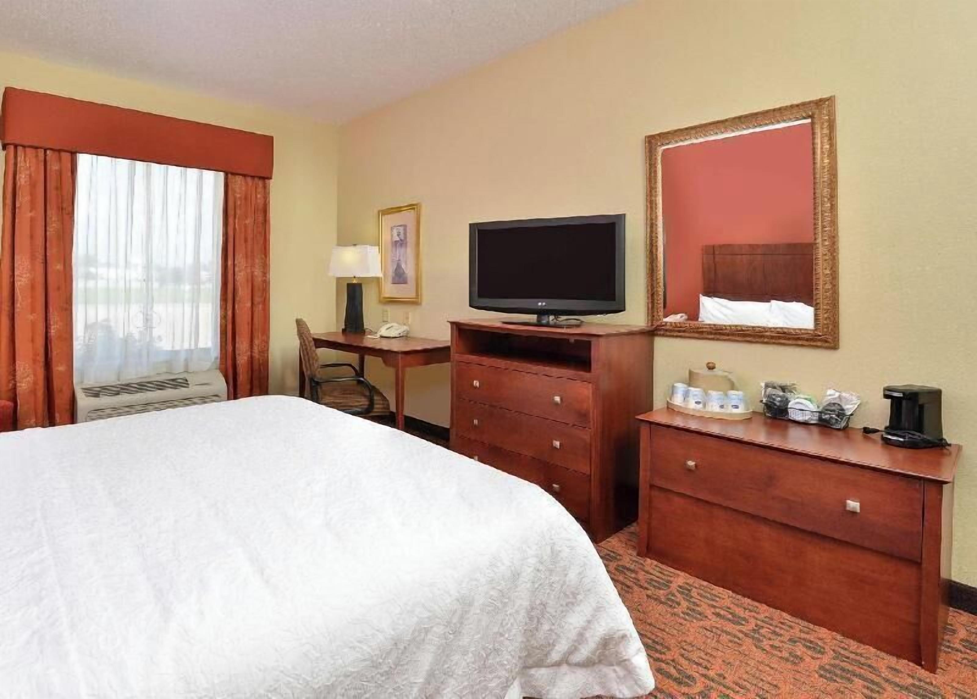 Desk, laptop workspace, blackout curtains, iron/ironing board