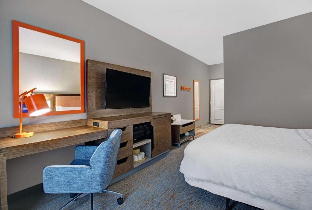 Desk, laptop workspace, blackout curtains, iron/ironing board