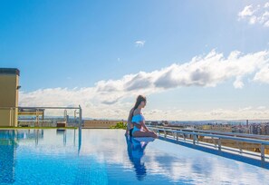 Outdoor pool, pool umbrellas, pool loungers
