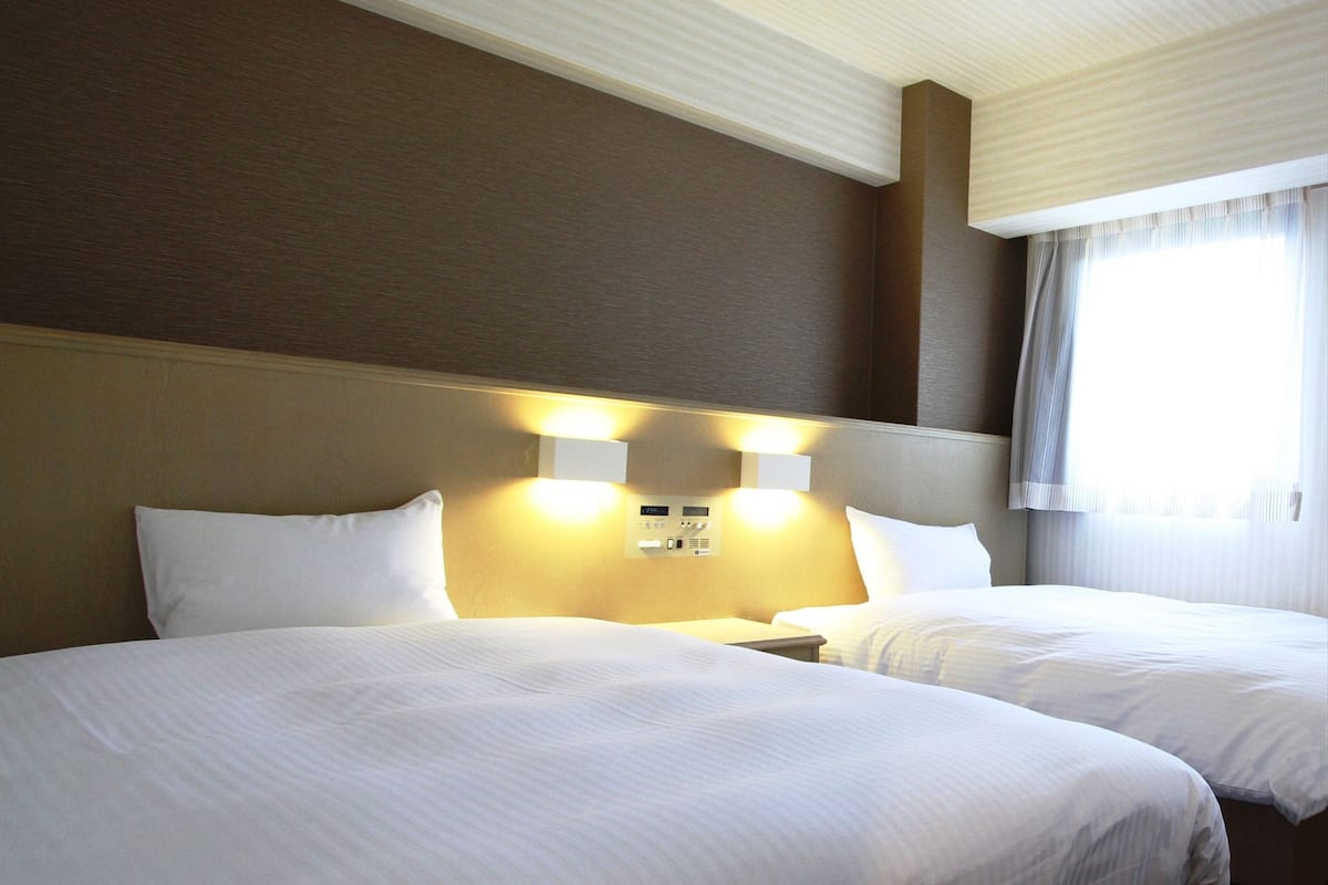 Down duvets, individually furnished, desk, blackout curtains