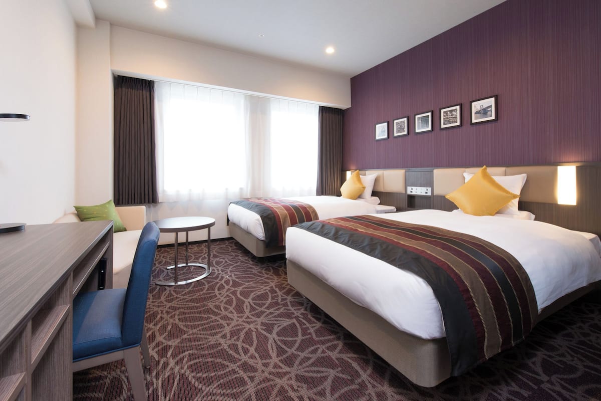 Premium bedding, down comforters, desk, blackout drapes