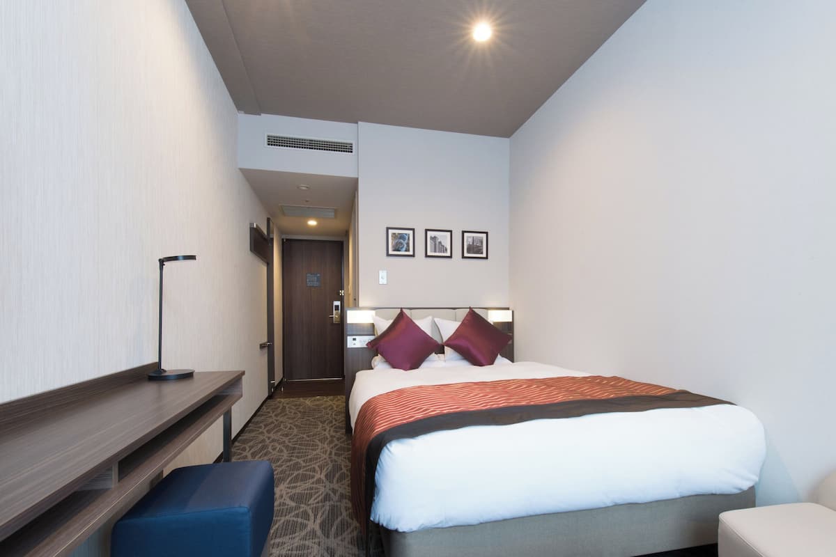 Premium bedding, down comforters, desk, blackout drapes