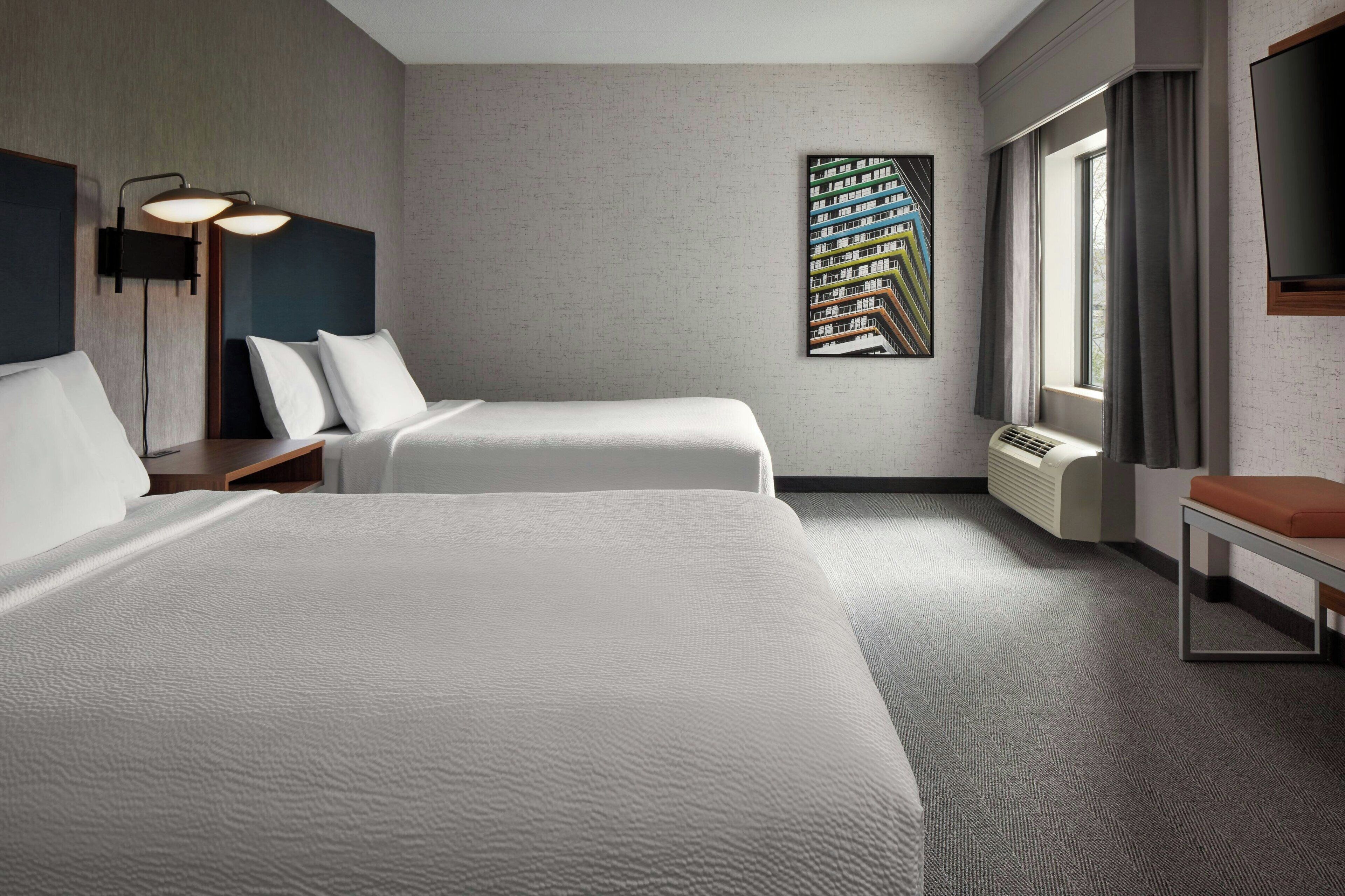 Suite, Multiple Beds | Desk, laptop workspace, blackout drapes, iron/ironing board