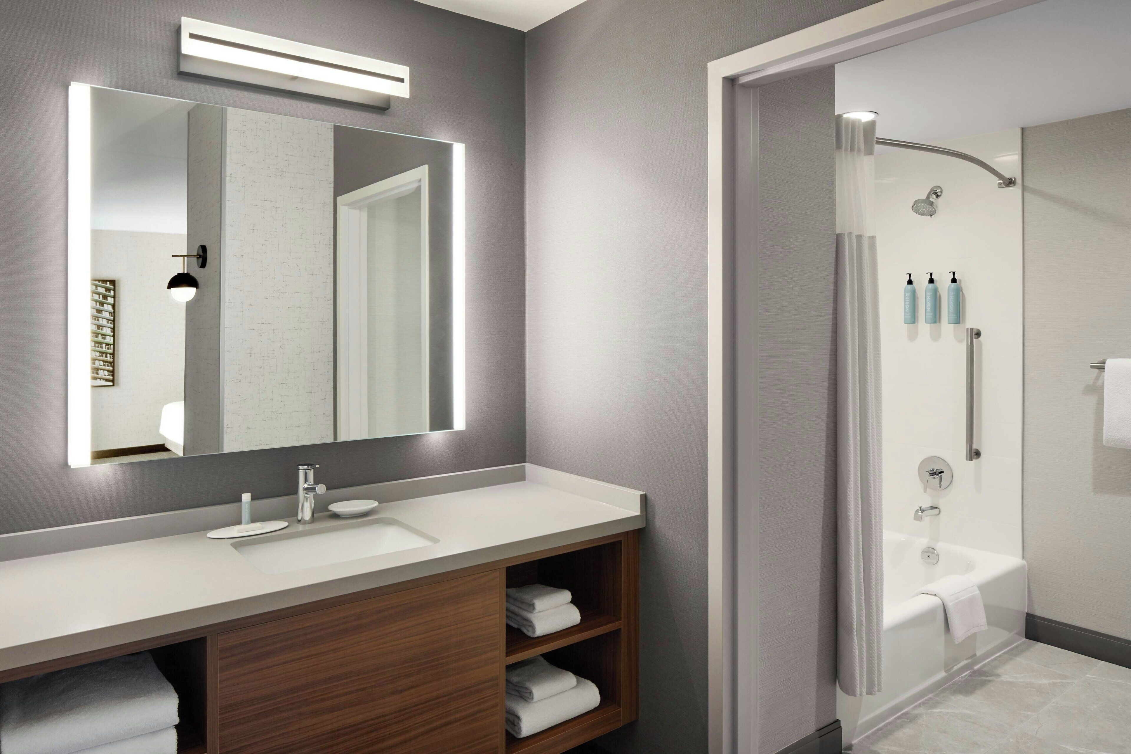 room, 1 king bed with sofa bed (guest room) | bathroom | combined shower/bathtub, free toiletries, hair dryer, towels