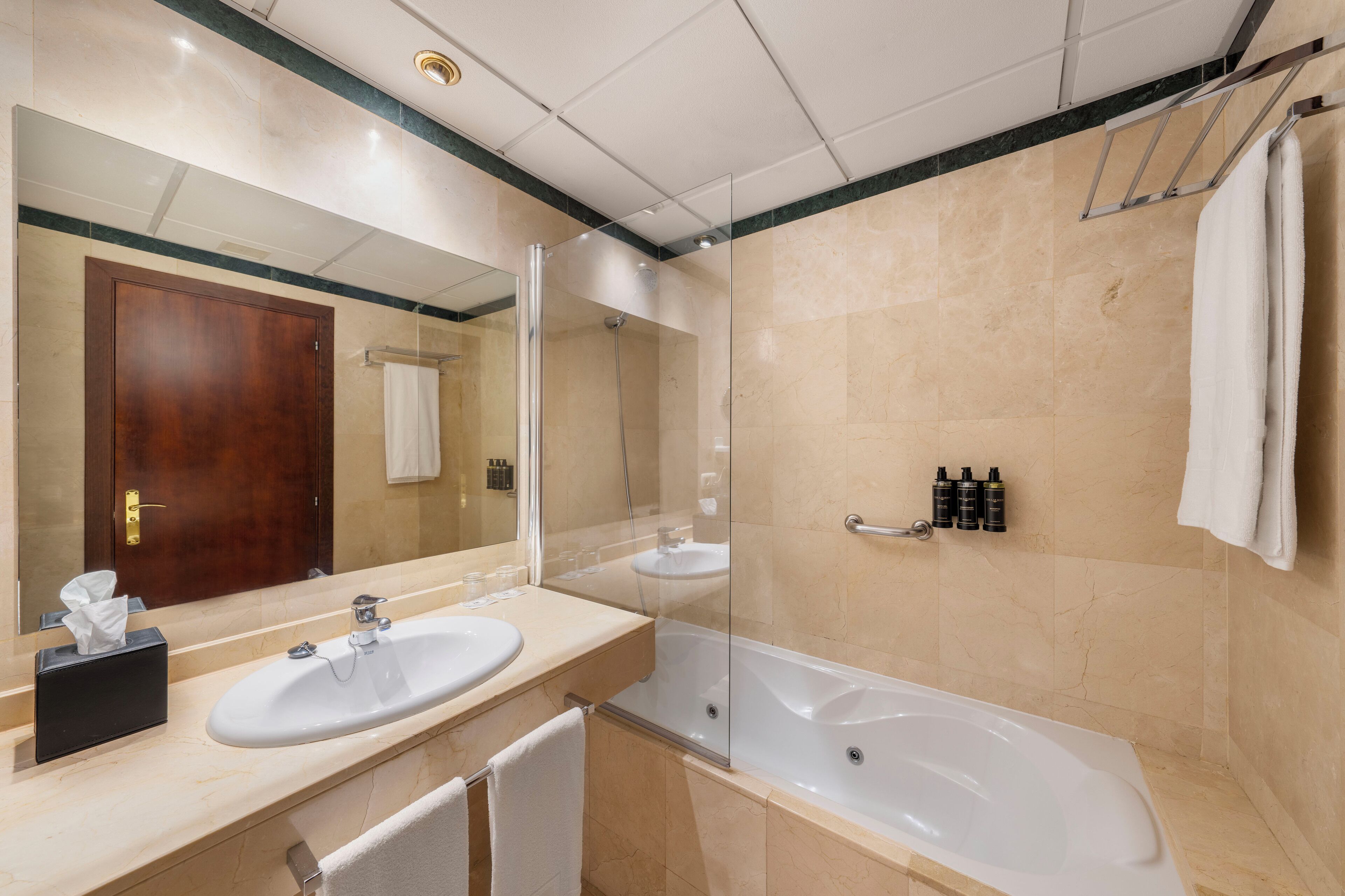 shower, eco-friendly toiletries, hair dryer, towels