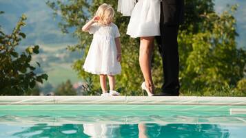 Seasonal outdoor pool, pool umbrellas, pool loungers