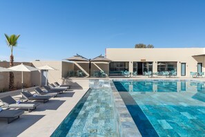 Outdoor pool, pool umbrellas, pool loungers