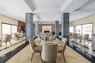 Breakfast, lunch served; local and international cuisine, pool views 