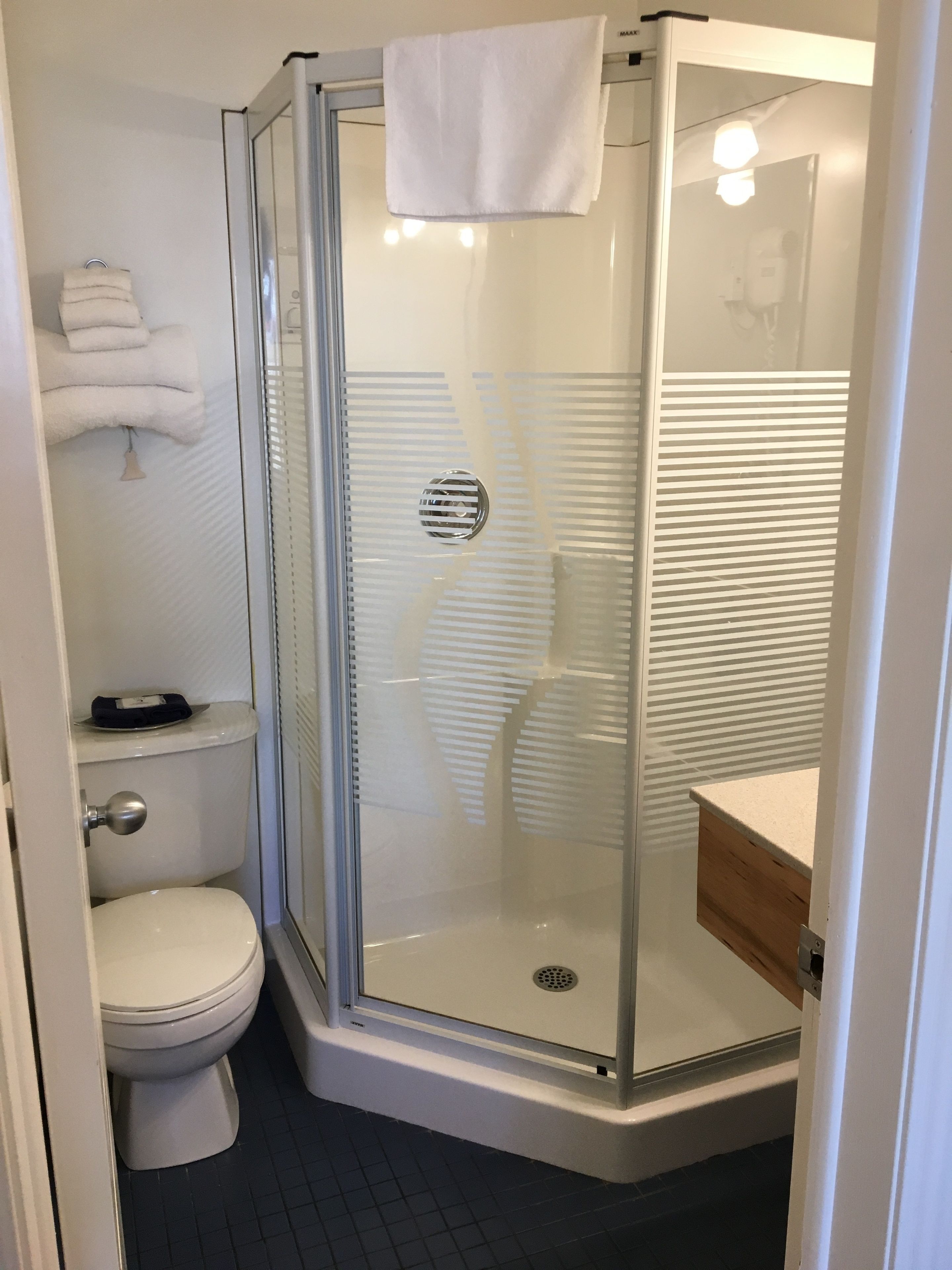 town view compact king room | bathroom | eco-friendly toiletries, hair dryer, towels