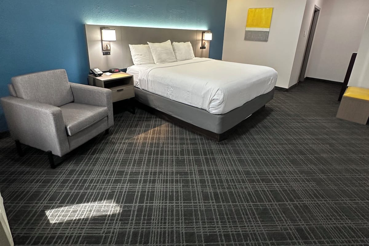 Suite, 1 King Bed, Non Smoking | 1 bedroom, desk, laptop workspace, soundproofing