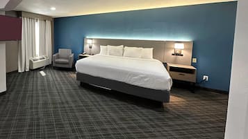 Suite, 1 King Bed, Non Smoking | Desk, laptop workspace, soundproofing, iron/ironing board