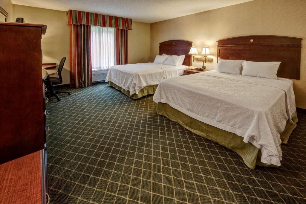 Premium bedding, pillowtop beds, desk, laptop workspace