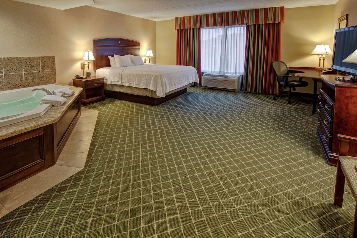 Premium bedding, pillow-top beds, desk, laptop workspace