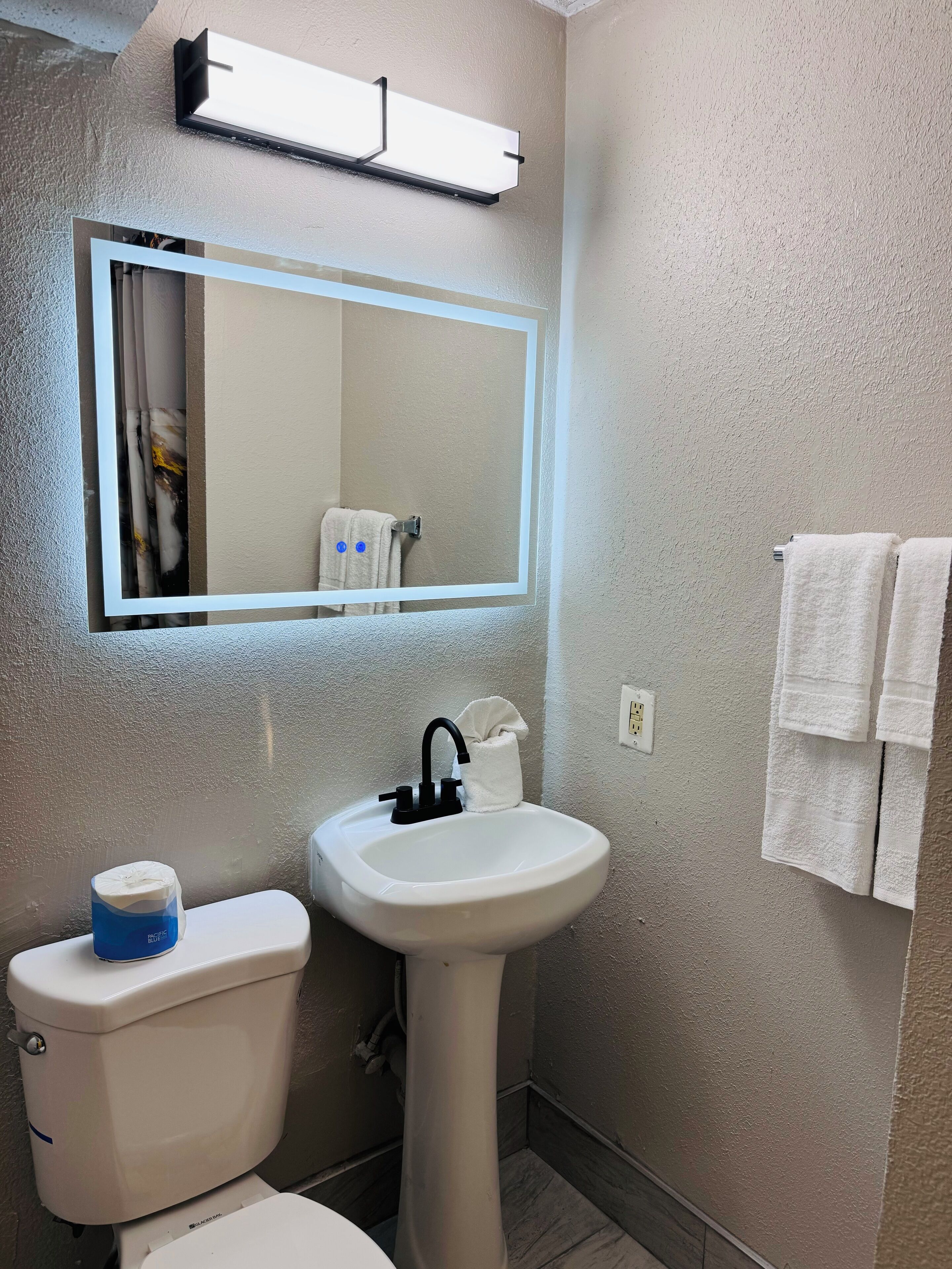 Shower, free toiletries, hair dryer, towels