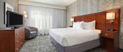 Premium bedding, pillow-top beds, desk, laptop workspace