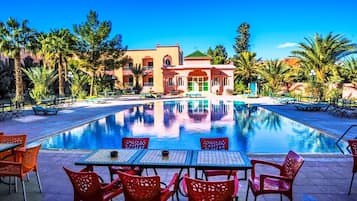 Seasonal outdoor pool, pool umbrellas, pool loungers