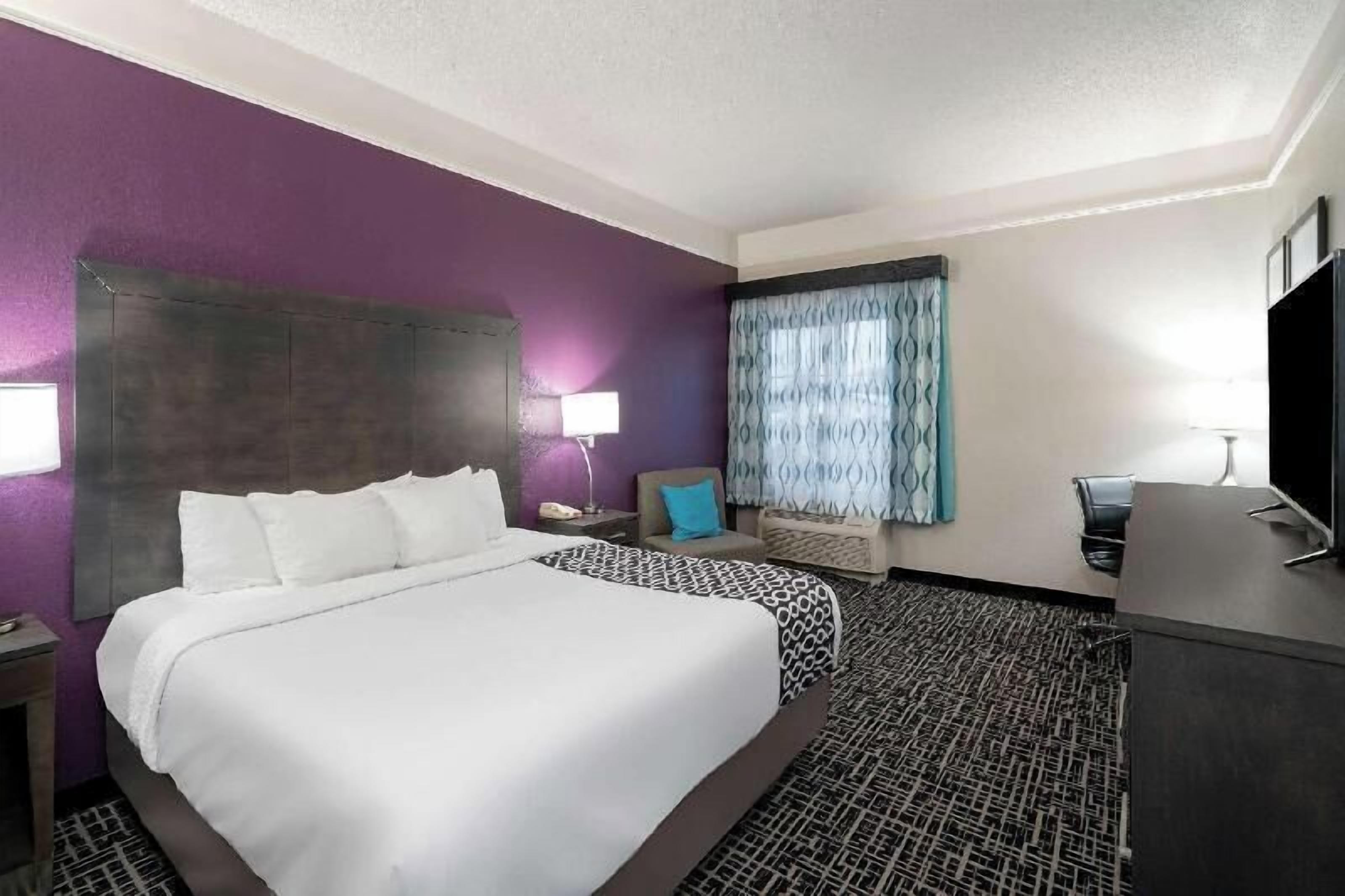 Premium bedding, pillowtop beds, desk, laptop workspace