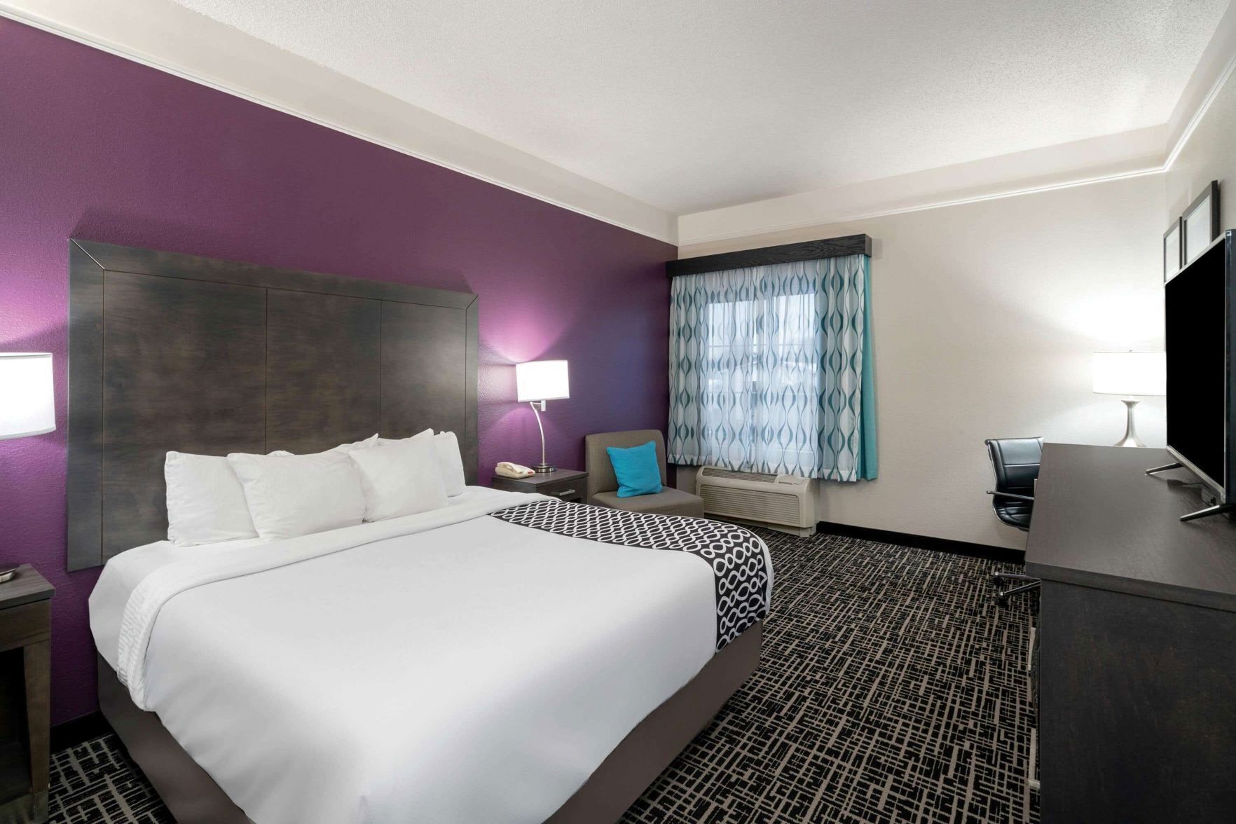 Premium bedding, pillowtop beds, desk, laptop workspace