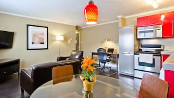 City Suite, 1 Bedroom | Living area | 50-inch flat-screen TV with cable channels, TV