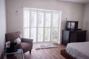 Suite, 1 King Bed | Living room | Flat-screen TV