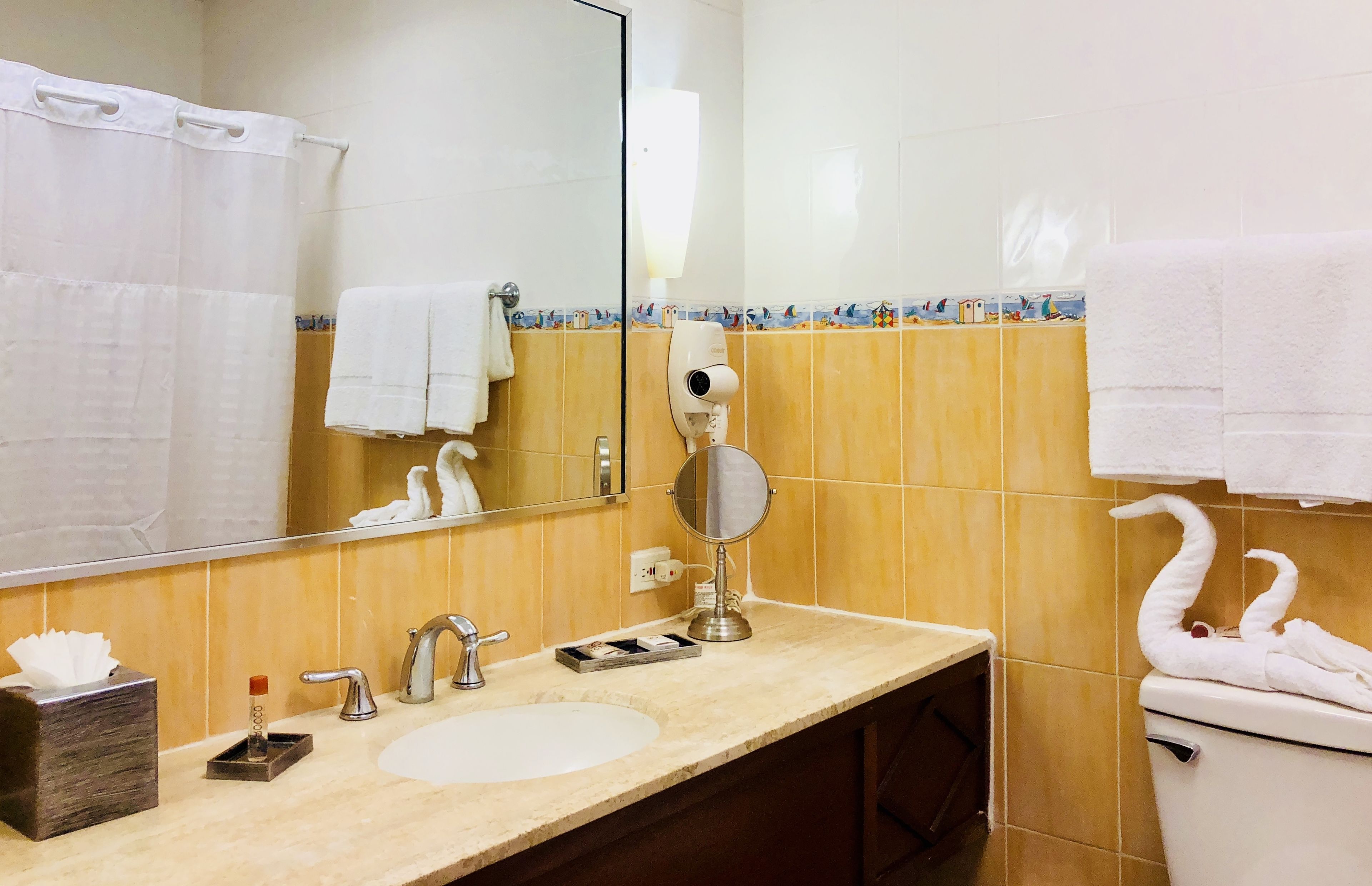 deluxe double room | bathroom | shower, free toiletries, hair dryer, towels