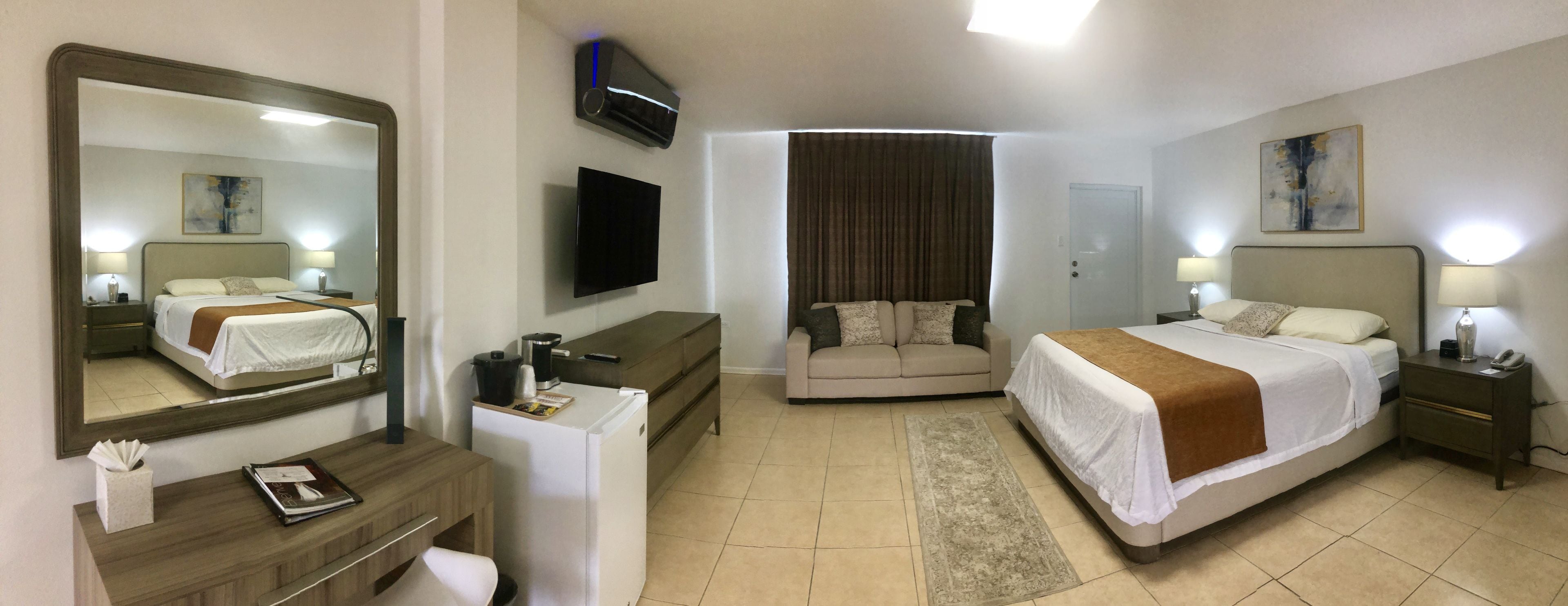 deluxe room, 1 king bed | in-room safe, individually decorated, individually furnished