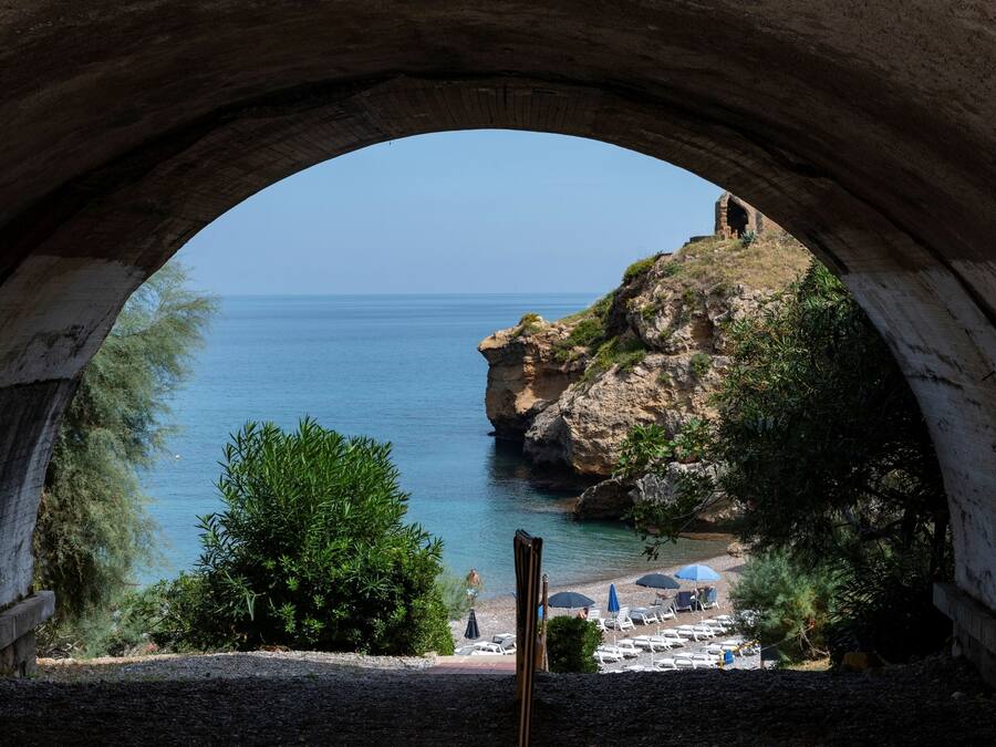 Private beach, sun loungers, beach umbrellas, windsurfing