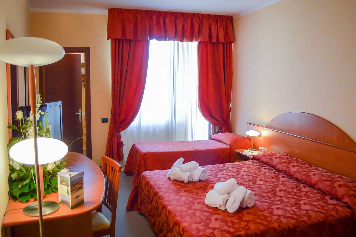 Family Room | Select Comfort beds, minibar, in-room safe, desk
