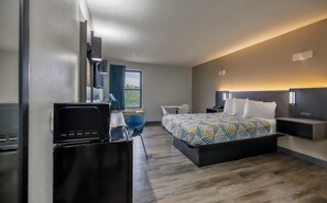 Deluxe Room, 1 Queen Bed, Non Smoking, Refrigerator & Microwave | Free WiFi, bed sheets