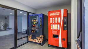 A vending machine area with a Coca-Cola machine and a snack vending machine. - Motel 6 Franklin, OH (Franklin)