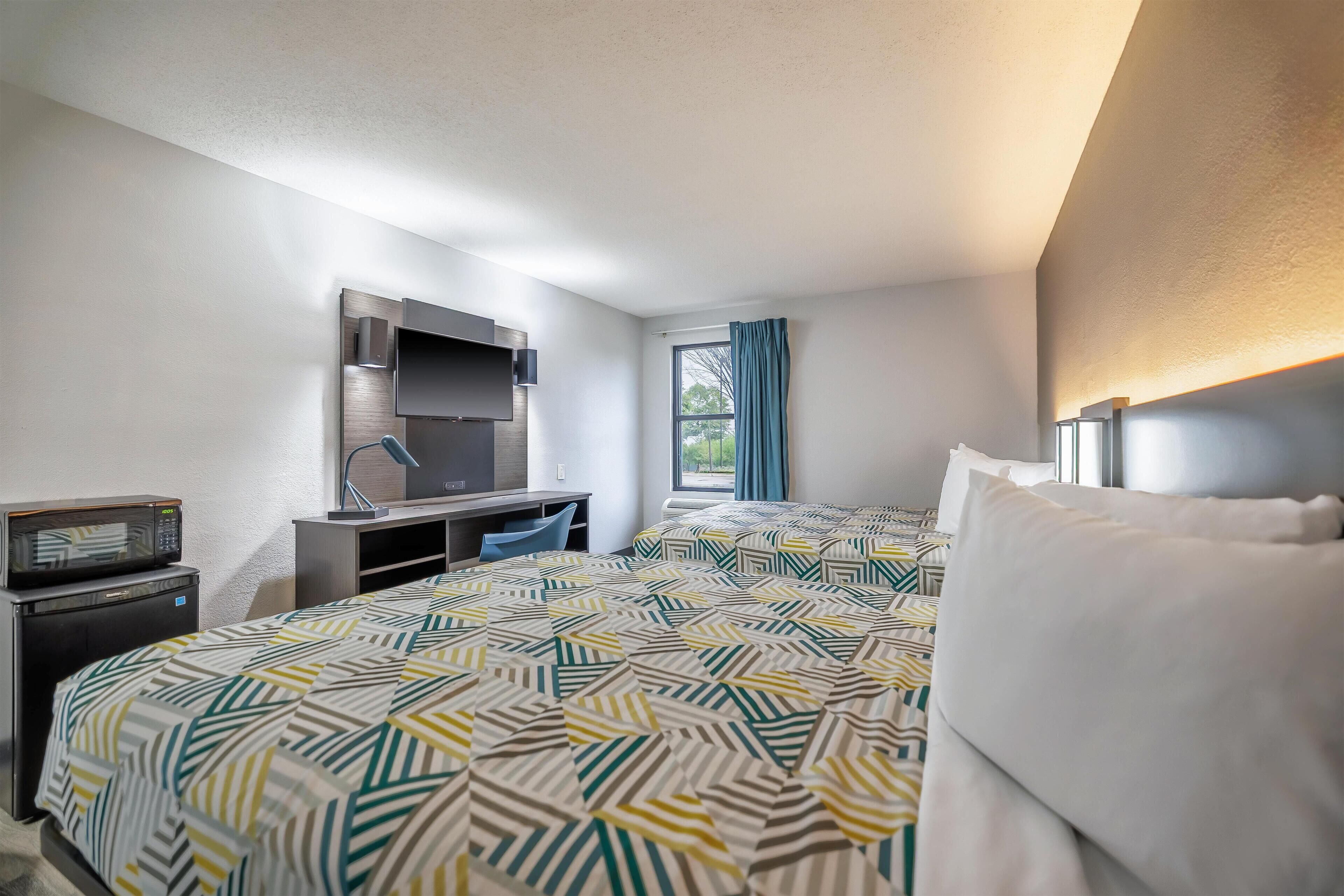 Deluxe Room, 2 Queen Beds, Non Smoking, Refrigerator & Microwave | Free WiFi, bed sheets