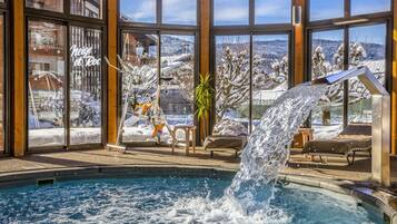Indoor pool, seasonal outdoor pool, pool umbrellas, pool loungers