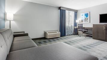 Suite, 1 King Bed with Sofa bed, Non Smoking | Premium bedding, down comforters, pillowtop beds, desk