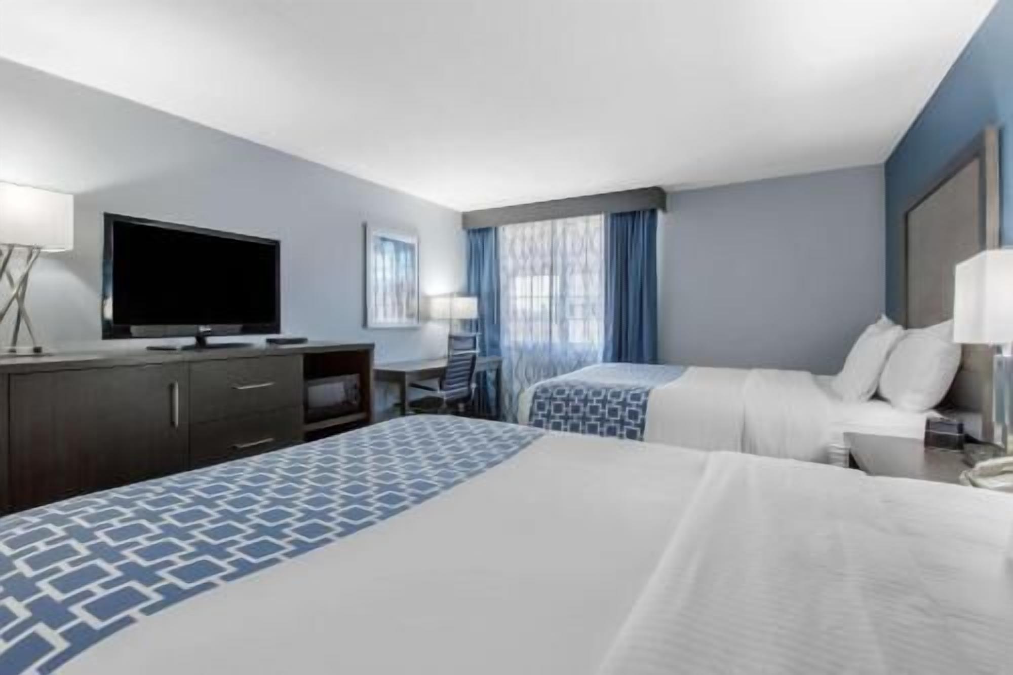 Premium bedding, down comforters, pillowtop beds, desk