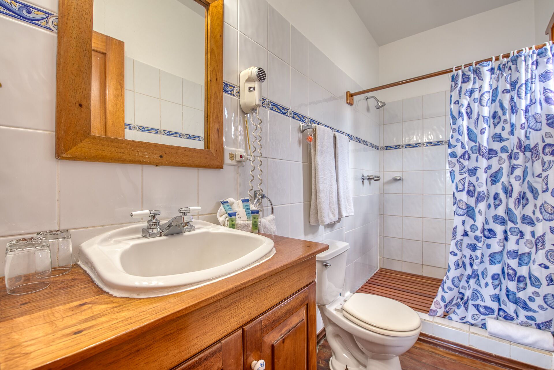 premium room, sea view | premium bedding, in-room safe, desk, iron/ironing board