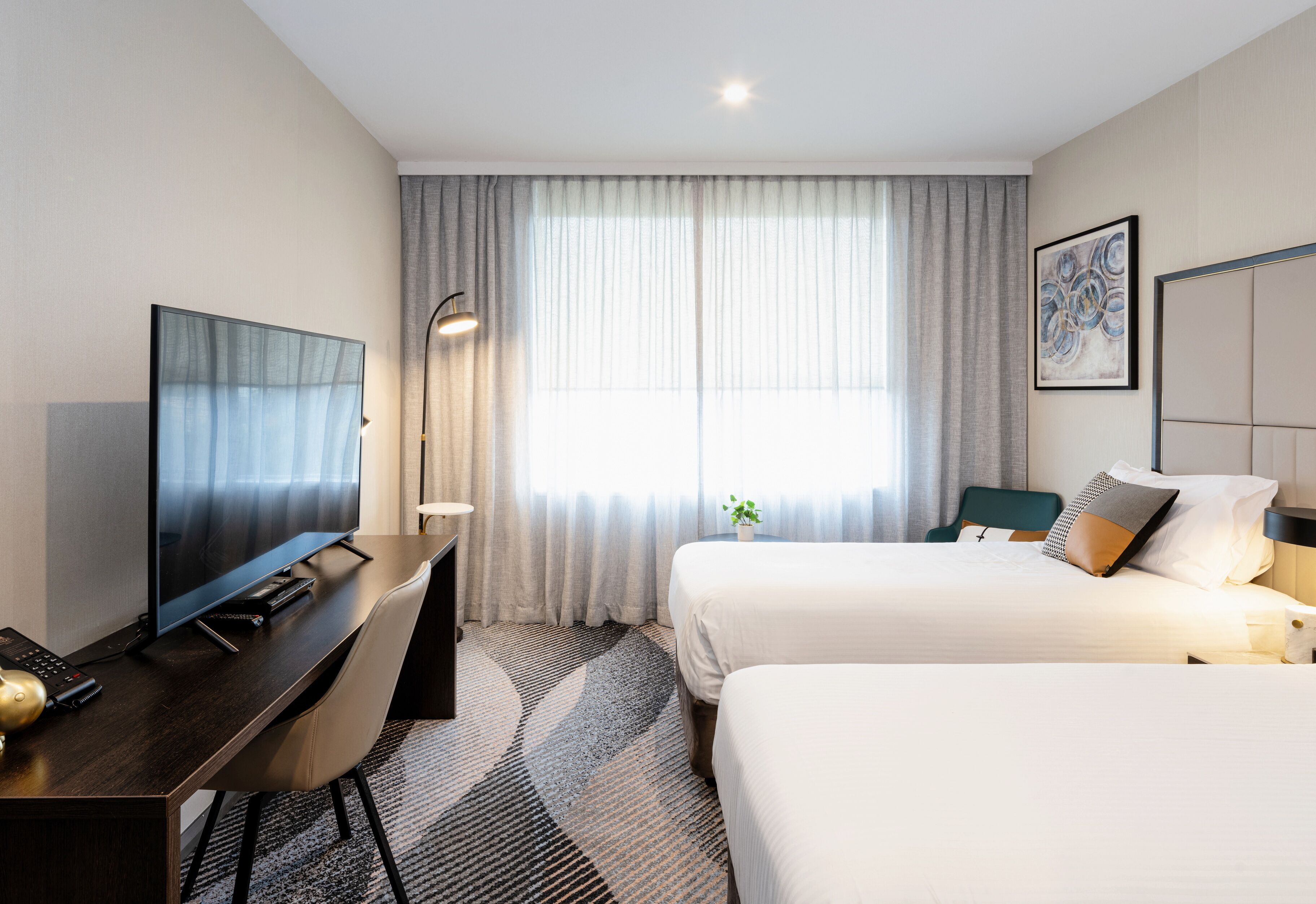 desk, laptop workspace, blackout curtains, iron/ironing board