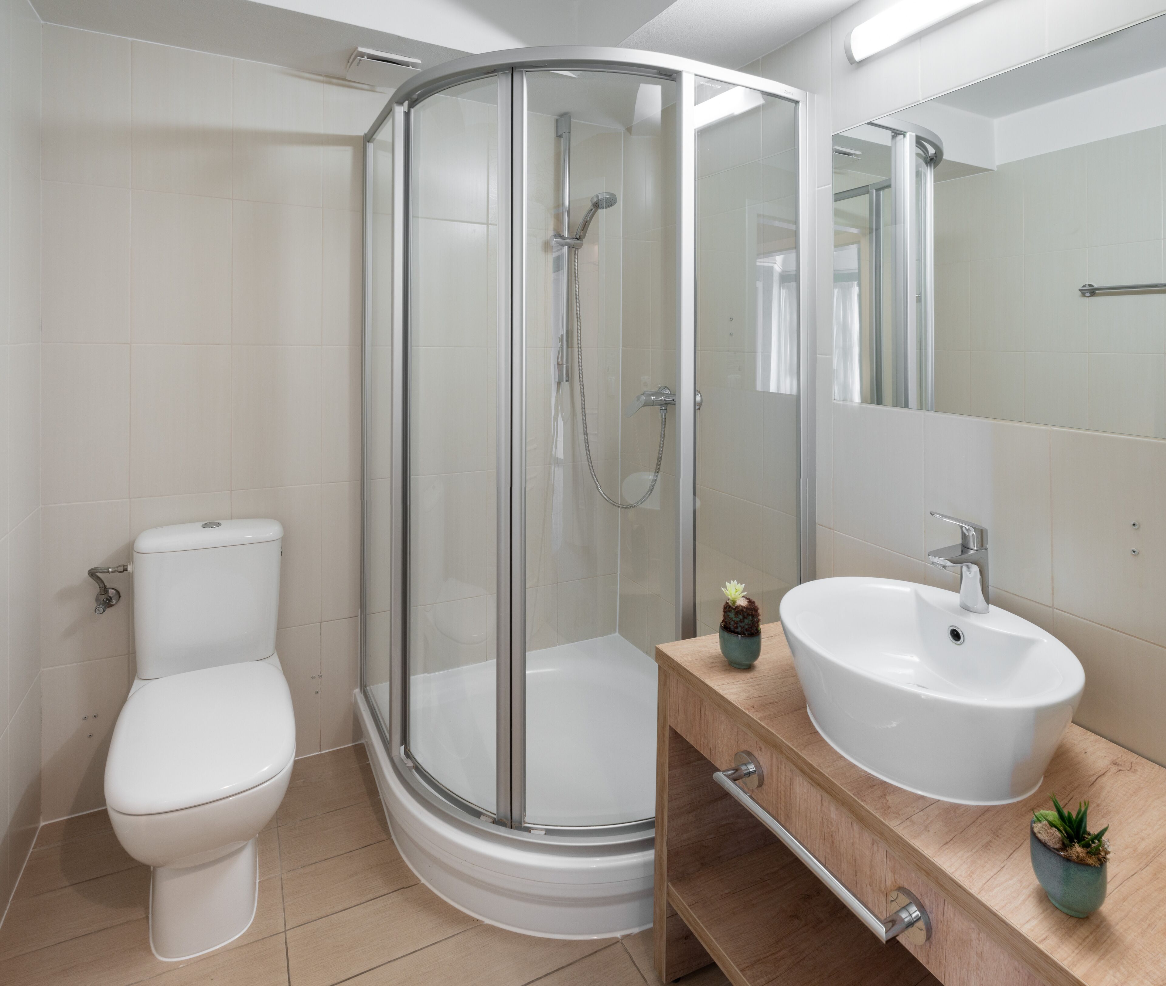 deluxe double room, 1 queen bed | bathroom | shower, designer toiletries, hair dryer, towels