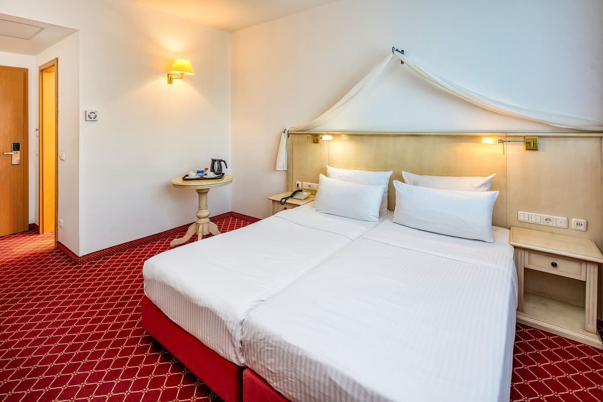 Standard Room | Premium bedding, minibar, in-room safe, desk