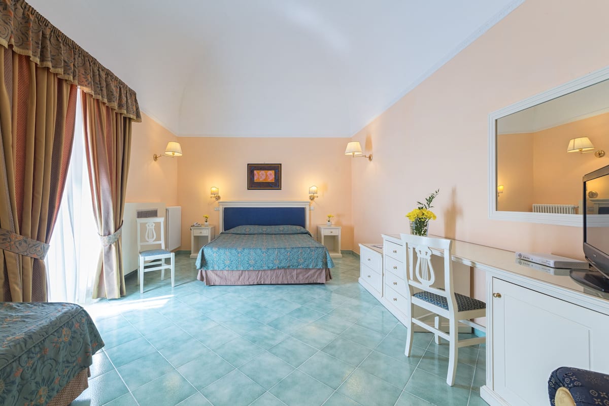 Premium bedding, down duvets, memory-foam beds, minibar