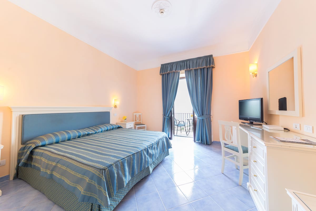 Premium bedding, down duvets, memory-foam beds, minibar
