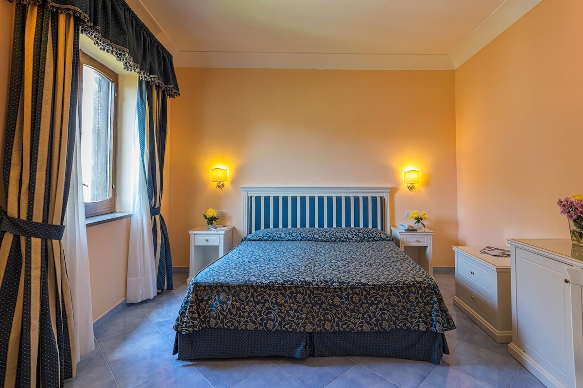 Premium bedding, down duvets, memory-foam beds, minibar