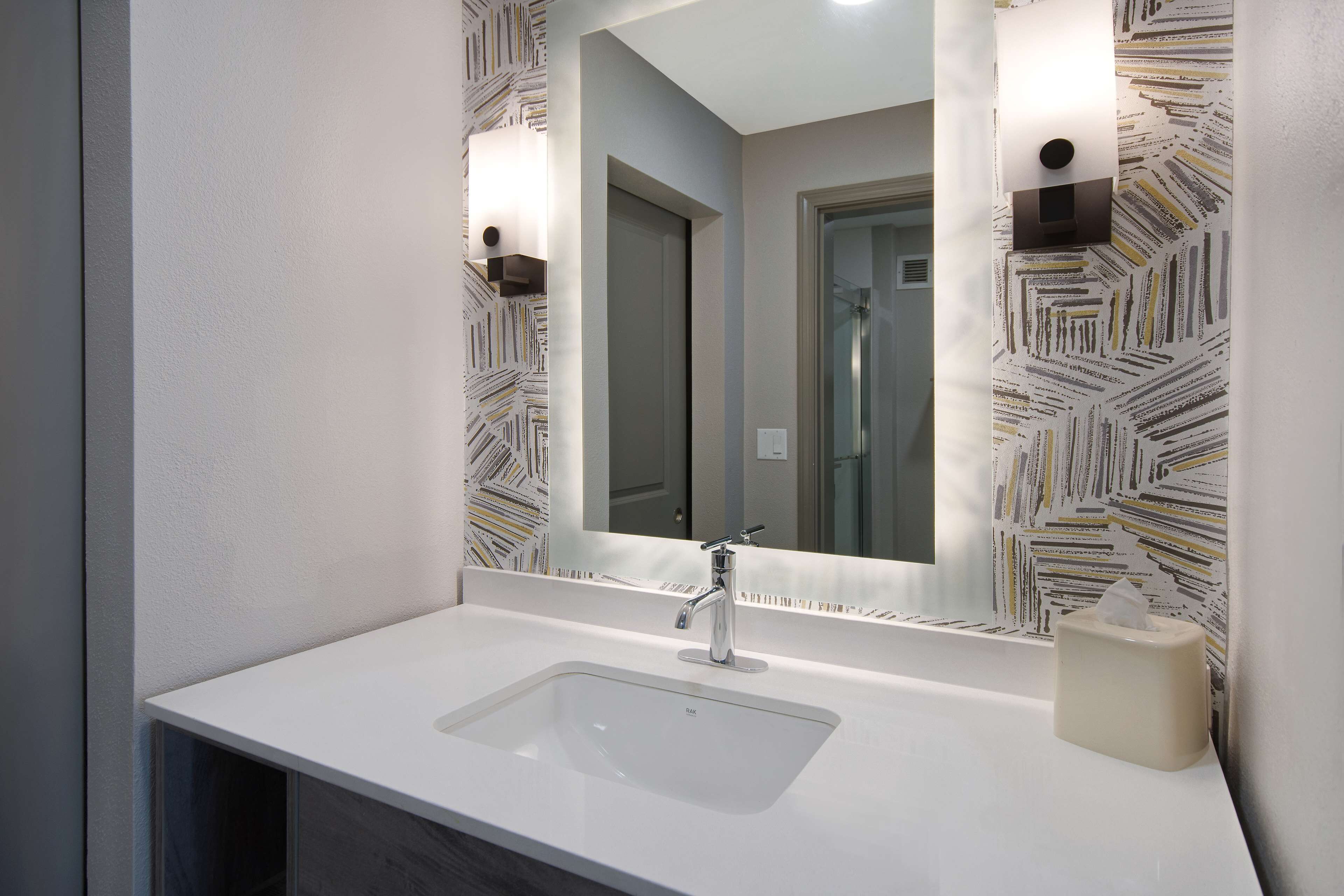 studio suite, 1 king bed with sofa bed | bathroom | combined shower/bathtub, hydromassage showerhead, free toiletries