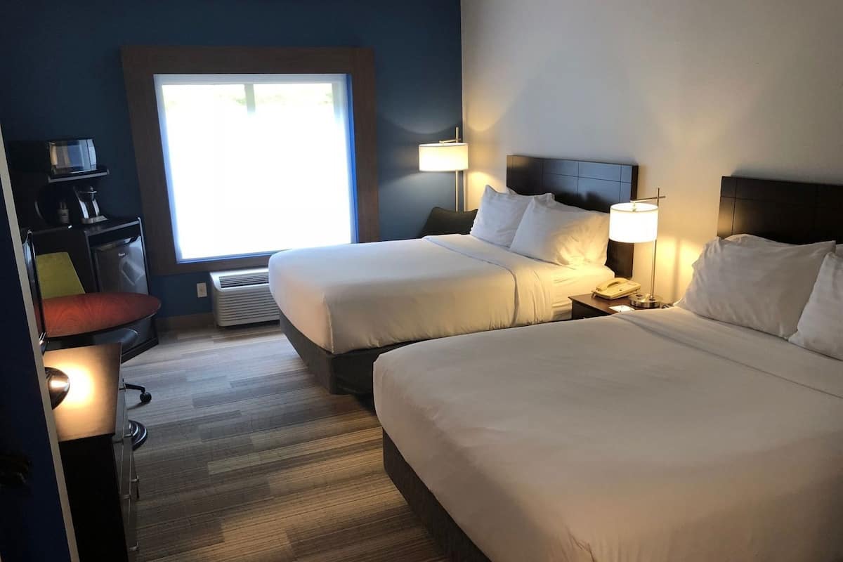 Desk, blackout drapes, iron/ironing board, cribs/infant beds