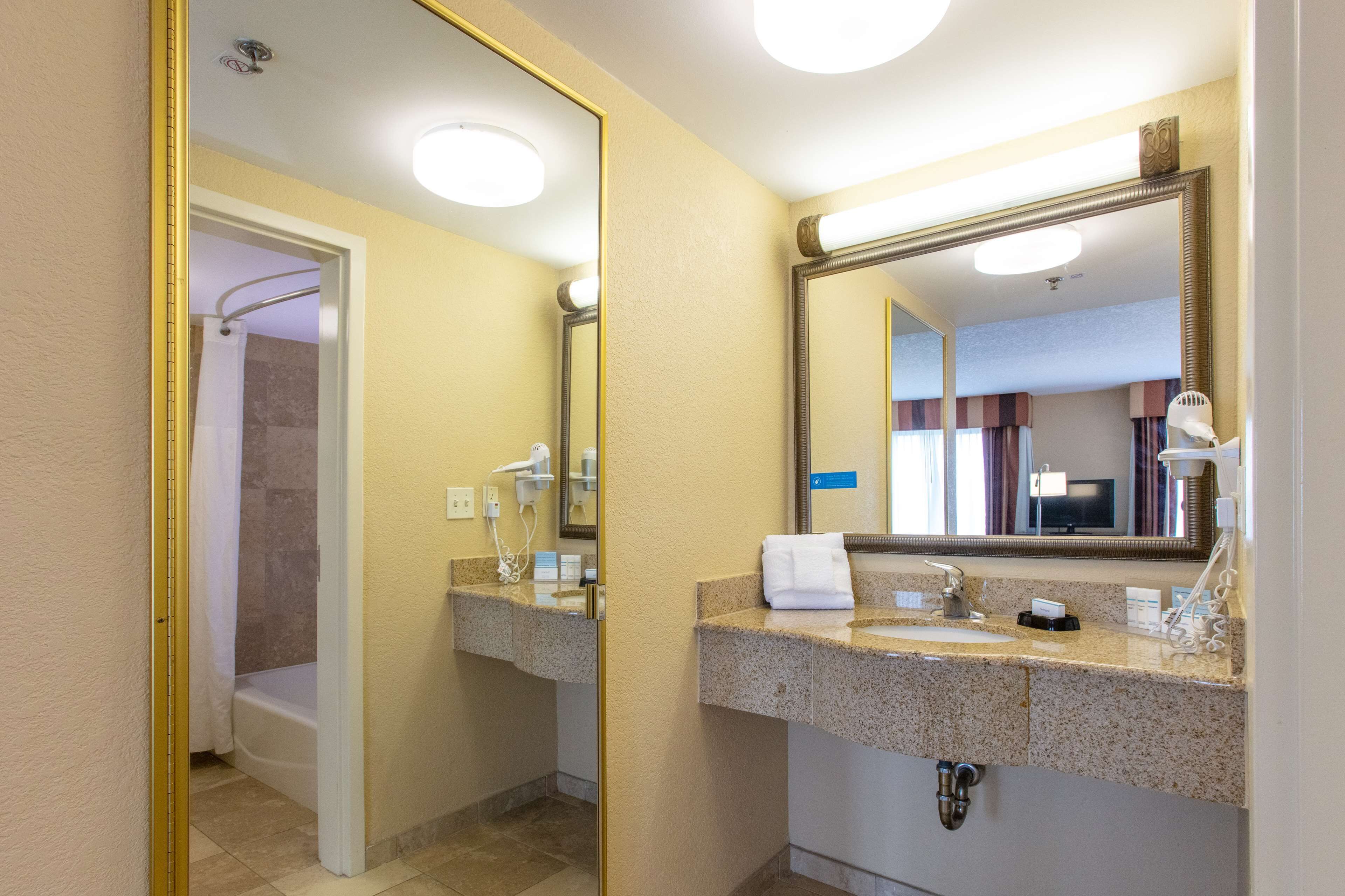 studio, 2 queen beds, accessible, non smoking (mobility/hearing accessible w/ tub) | bathroom | combined shower/bathtub, hair dryer, towels